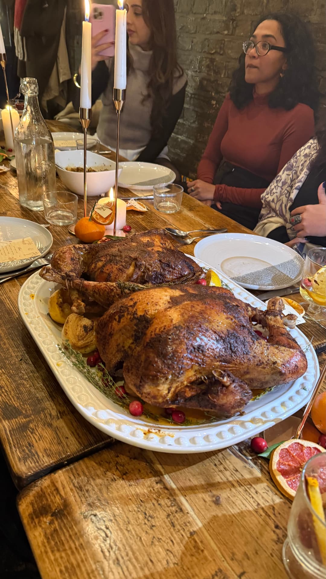 Pakistani-spiced roast turkey served at a candlelit holiday table