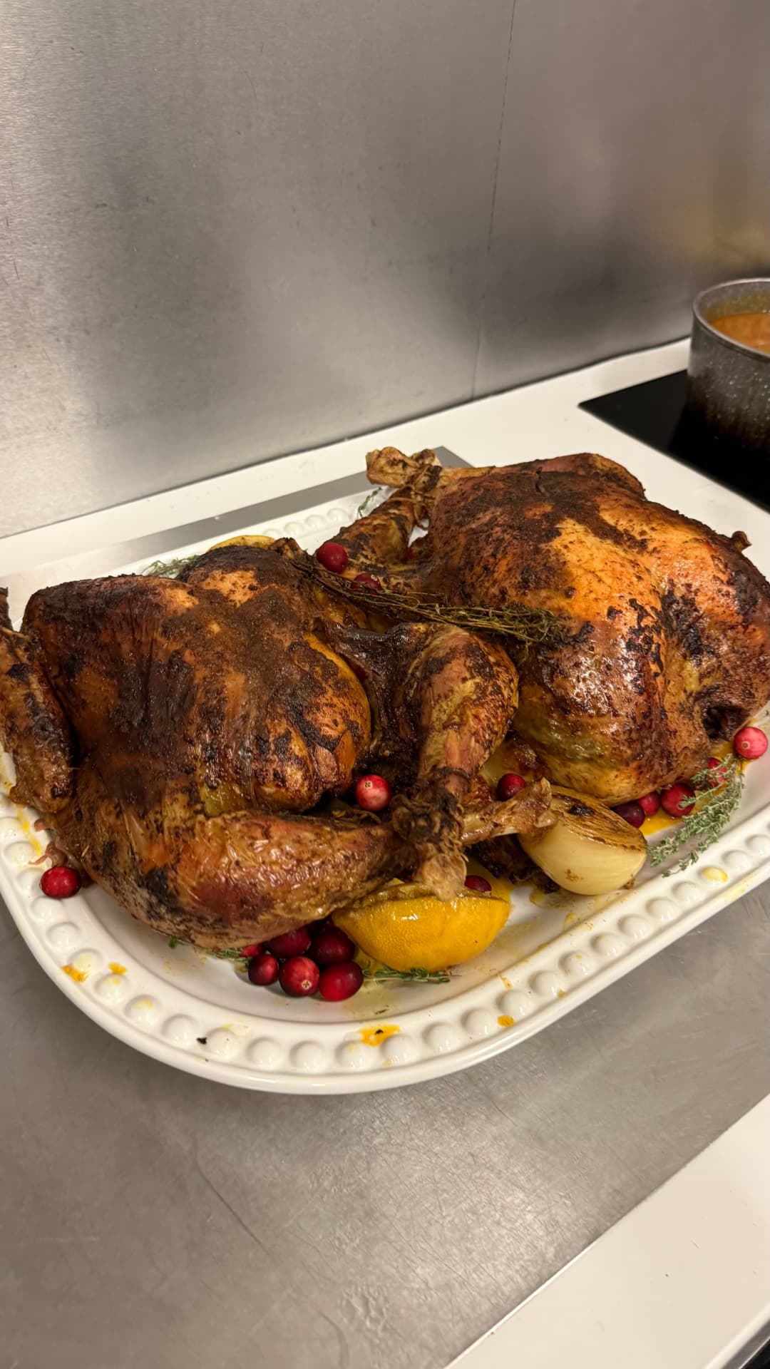 Two spice-marinated roast turkeys prepared for a holiday gathering