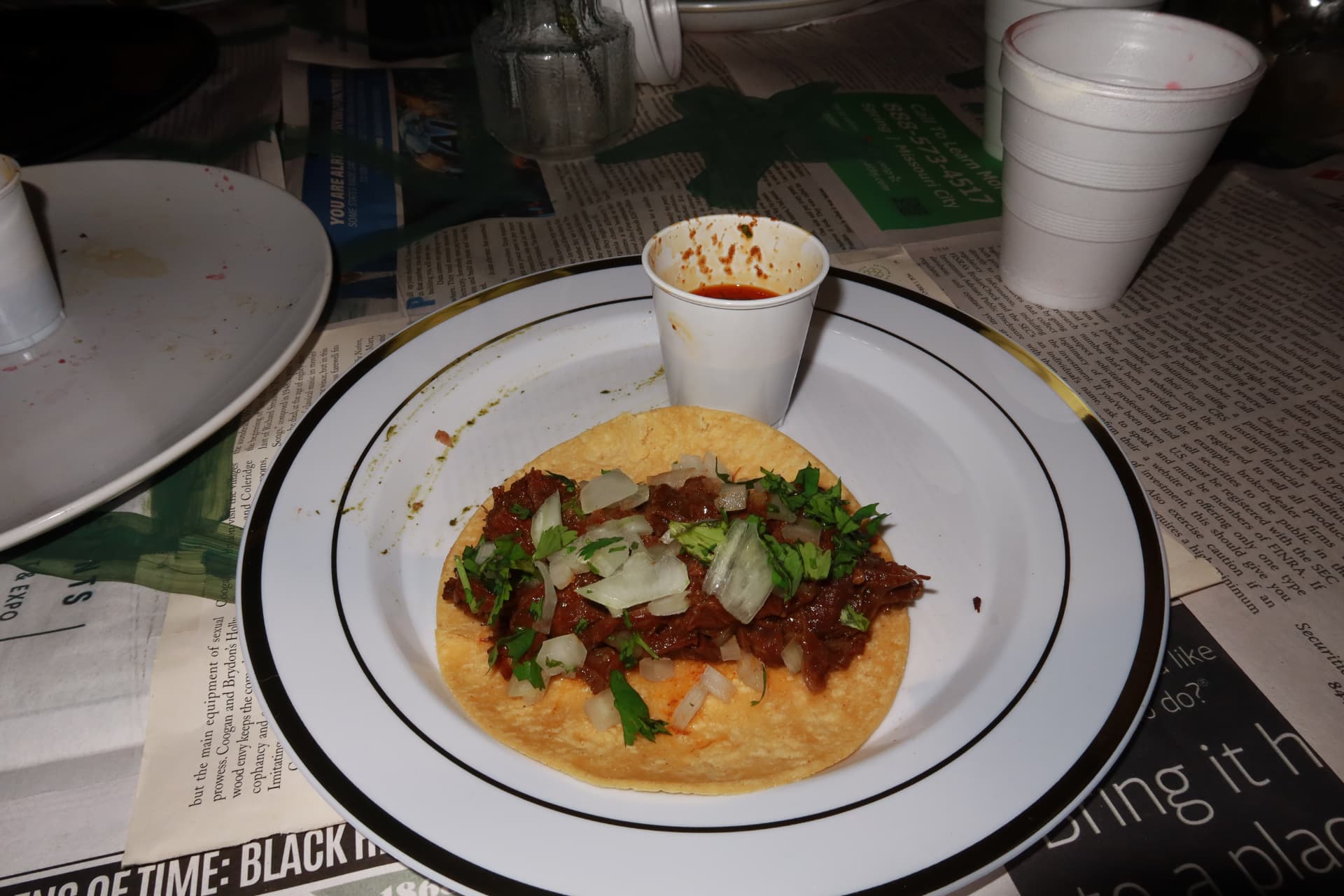 A taco served with sauce at the supper club
